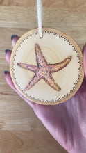 Load and play video in Gallery viewer, Starfish Wood Burned Ornament
